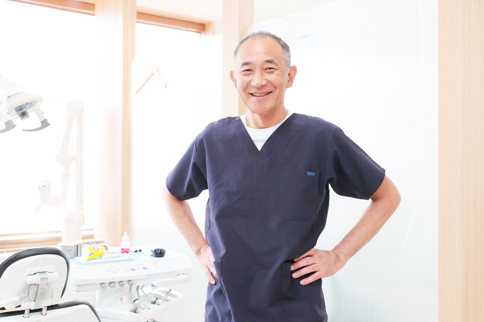 歯科医師　富田 文貞